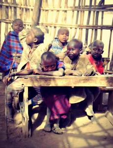 A_group_of_children_in_a_Masai_village_enjoying_one_of_their_lessons A_group_of_children_in_a_Masai_village_enjoying_one_of_their_lessons